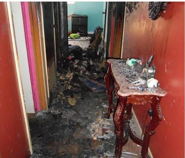 fire debris in hallway and on a small table